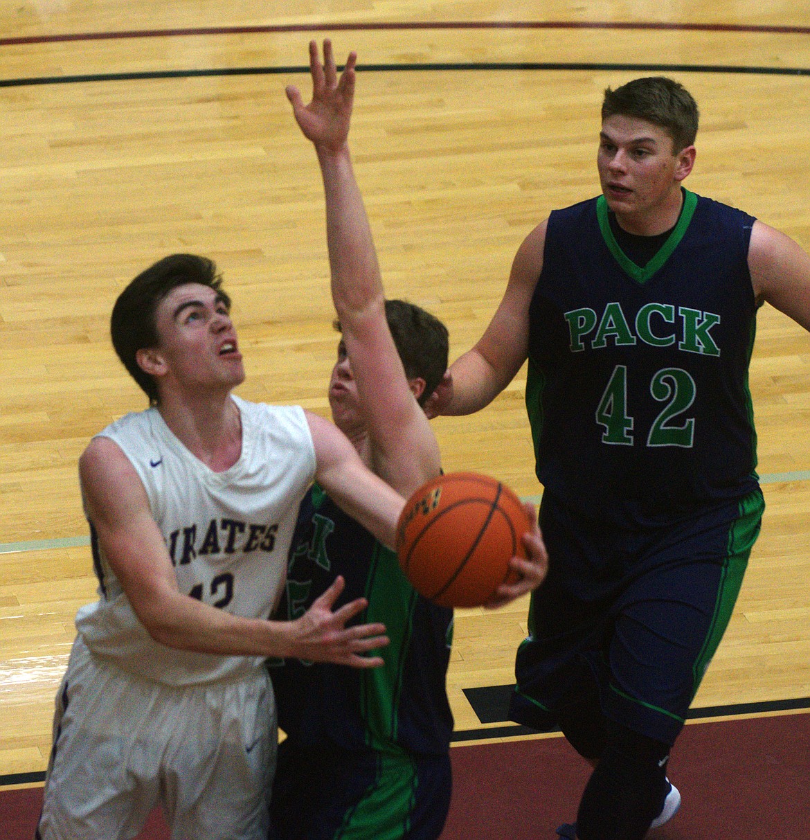 POLSON FORWARD Weston Danley drives to the basket in Thursday night&#146;s contest against Glacier at Salish Kootenai College. (Jason Blasco/Lake County Leader)