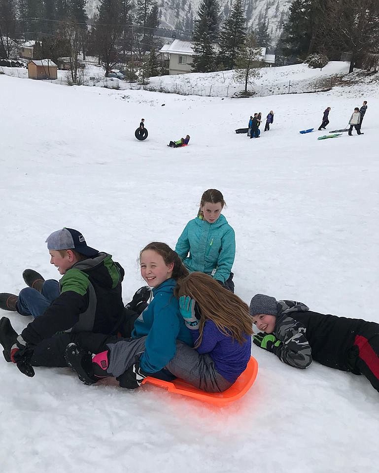 Superior 6th and 3rd graders enjoy a day of sledding last week as part of the schools Quarter Celebration for good behavior. (Photo courtesy of Superior Elementary School).