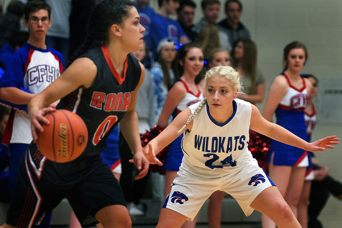 Wildkat Senior Diana Vasquez plays defense against Ronan&#146;s Micalann McCrea Saturday. The Kats downed the Maidens in contest, 68-41. (Jeremy Weber photo)