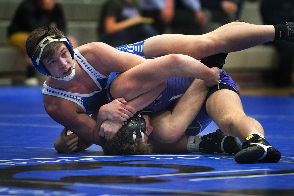 MatCat Ben Windauer pins Polson opponent Hunter Fritsch during action in Columbia Falls Tuesday. (Jeremy Weber photo)