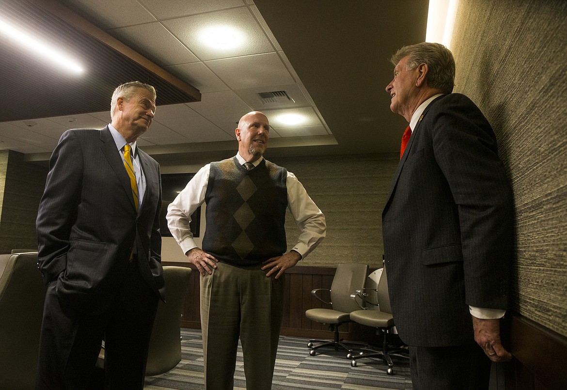 Coeur d&#146;Alene Press Publisher Larry Riley, center, chats with Idaho Governor Butch Otter, right, and Lieutenant Governor of Idaho Brad Little Monday morning at the Press. (LOREN BENOIT/Press)