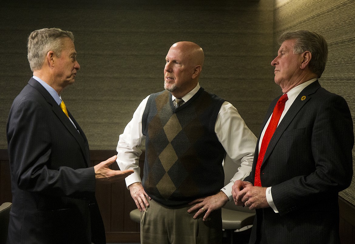 Coeur d&#146;Alene Press Publisher Larry Riley, center, chats with Lieutenant Governor of Idaho Brad Little, left, and  Idaho Governor Butch Otter Monday morning at the Press. (LOREN BENOIT/Press)