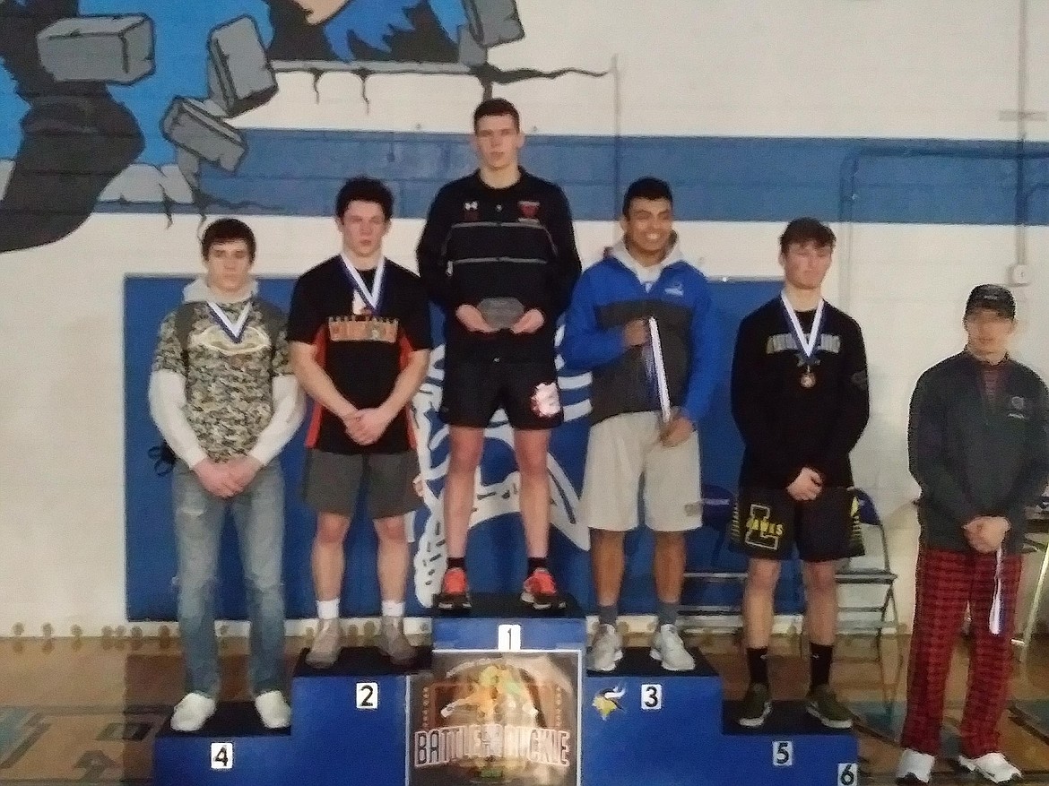 (Courtesy photo)
Hyrum Hunsaker stands atop the podium after claiming the North Idaho Rumble championship at 170 pounds.