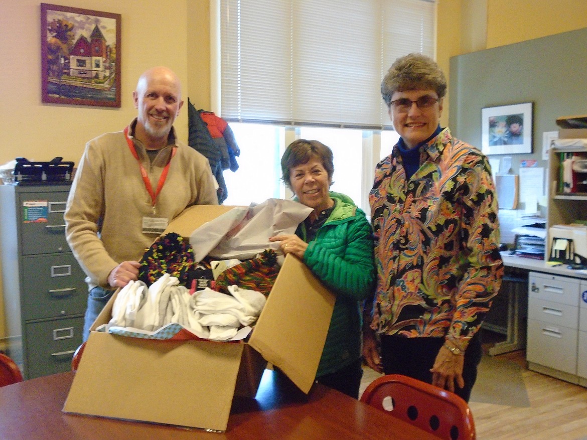 First Presbyterian Church of Sandpoint contributes to a Tree of Warmth each holiday season.  Deacons Sue Helander and Anna Bates deliver bounties of mittens, hats, and scarves to Jim Brown, Family Advocate Director of North Idaho College Head Start.

(Courtesy photo)