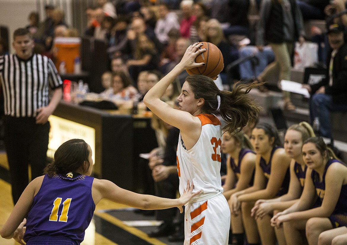 Melody Kempton looks to pass the ball to a teammate during Tuesday night's 5A Region 1 Championship game. (LOREN BENOIT/Press)