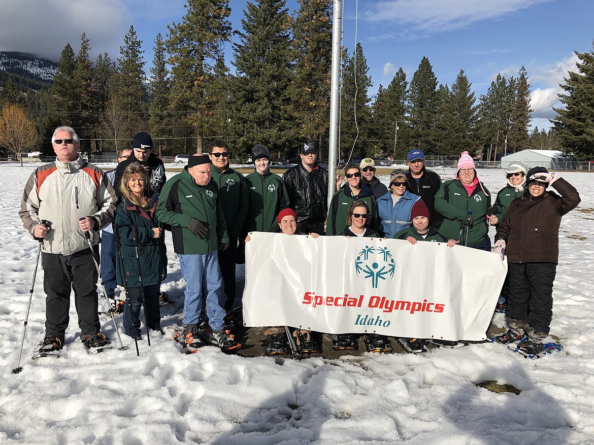 Courtesy photo
The Coeur d&#146;Alene Special Olympics Nordic Team is training for Winter Regionals Feb. 24 in Kellogg. Sitting from left are Cheri Olson, Annette Johnson and Mark Pennestri; and standing from left, Robert Edwards, Ladawn Brinkman (volunteer), Brandon Carroll, Aaron Hildebrand, Tristen Wellman, Gayle Frechette, Kevin Johnson, Adina Linder, Dennis Brinkman (volunteer), Barb Wellman (volunteer), Jim McFeeley (coach), Robyn Dillworth, Sheri Elliot and Melisa Elliot. Not pictured is Kirk Grogan.