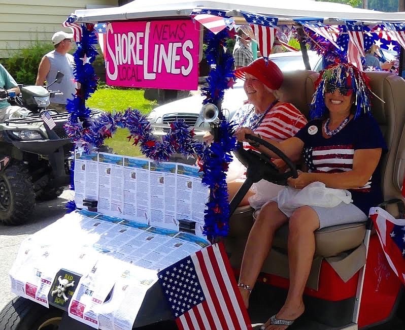 Courtesy photo
Sheryl Puckett, right, started the Shore Lines newsletter in 2015. Here she gets the word out about the publication with friend Margaret Nelson during a parade in Bayview.