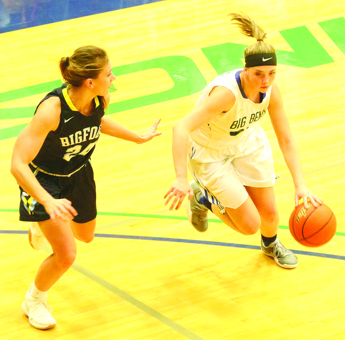 Connor Vanderweyst/Columbia Basin Herald
Big Bend guard Callie Gronning (right) drives to the basket against Spokane.