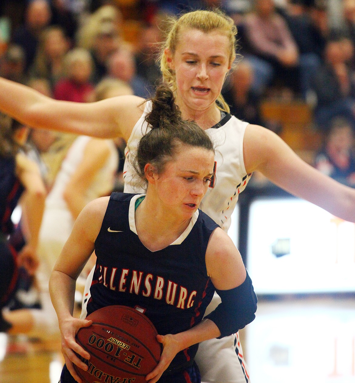 Rodney Harwood/Columbia Basin Herald 
Ephrata post Sydnee Pixlee (32) shuts down Ellensburg point guard Brinley Hagemeier (1) as she tries to drive the lane in the third quarter of Tuesday's district playoff game in Ephrata.
