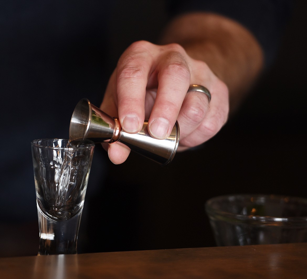 Jazper Torres pours a sample of the Vilya Spirits Absinthe Blanche.