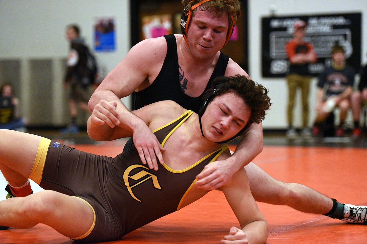 Flathead&#146;s Hunter Wellcome wrestles Helena Capital&#146;s Alec McVey-Touchette at 205 pounds at the Western AA Divisional seeding tournament at Flathead High School on Saturday. Wellcome won by decision, 6-2. (Casey Kreider/Daily Inter Lake)