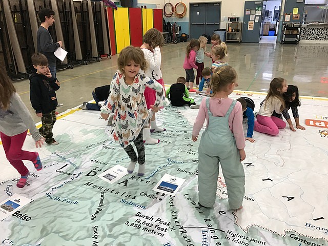 Students enjoy learning with the giant map.