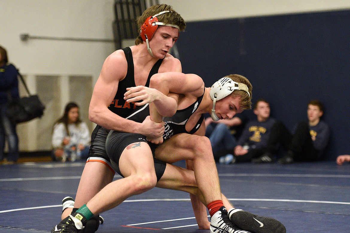 Flathead&#146;s Tanner Russell wrestles Missoula Sentinel&#146;s Conall Powers at 145 pounds at the Western AA Divisional seeding tournament at Flathead High School on Saturday. Russell won by decision. (Casey Kreider/Daily Inter Lake)