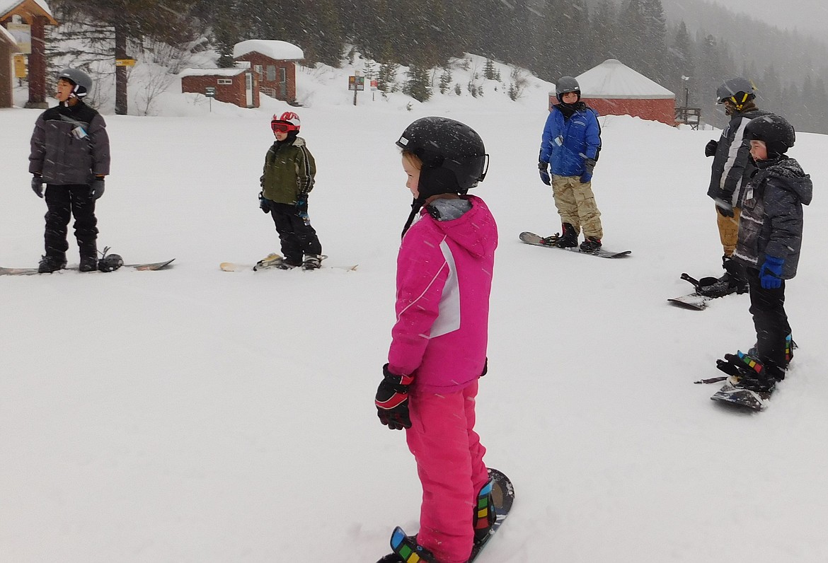 Students learn snowboarding at Schweitzer.