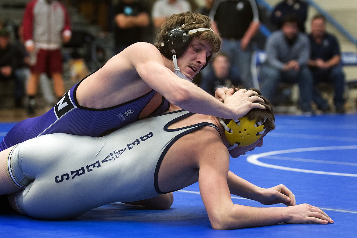 Polson&#146;s Parker Adler takes on Beaverhead County&#146;s Cooper Hoffman for the 152-pound title at the Class A Divisional Meet in Columbia Falls Saturday. (Jeremy Weber photo)