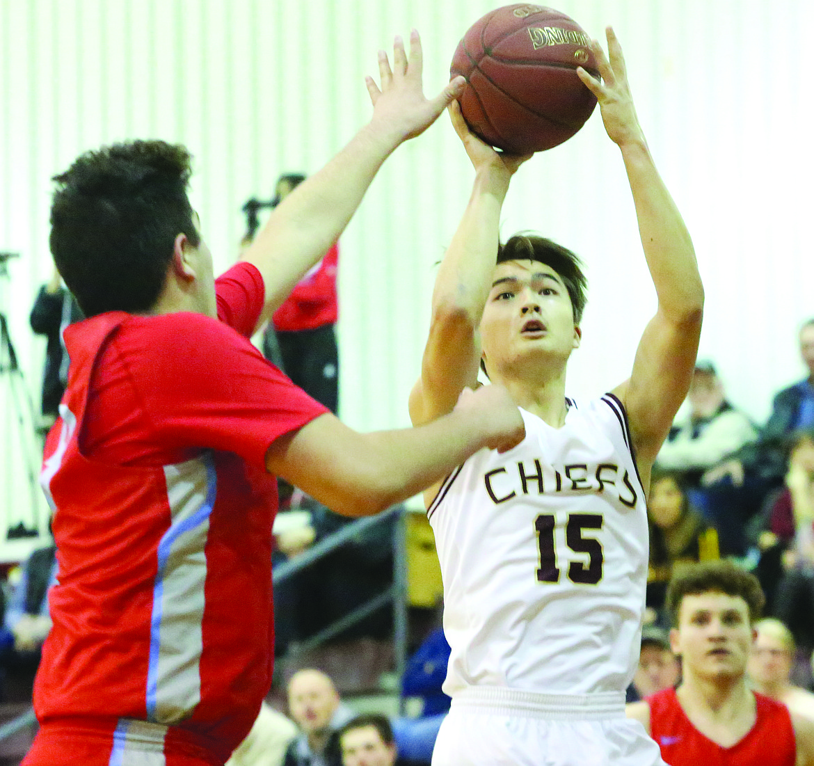 Connor Vanderweyst/Columbia Basin Herald
Moses Lake guard Evan McLean puts up a shot against West Valley.