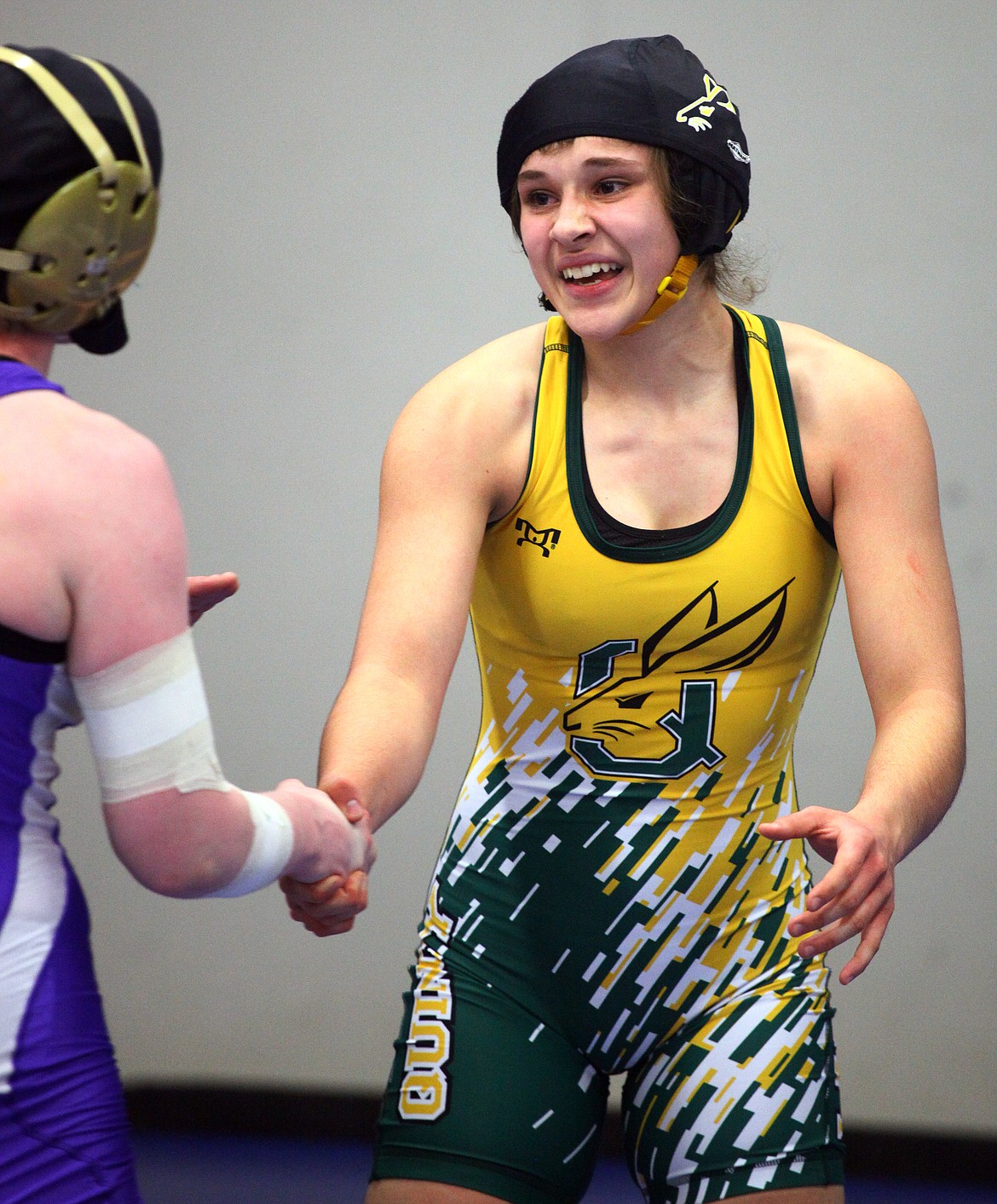 Rodney Harwood/Columbia Basin Herald
Quincy's Jaselyn Jones shakes Emily Carroll of Wenatchee's hand after pinning her to win the 135-pound championship on Saturday at the Girls Sub-Regional Tournament at Warden.