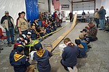 Scouts match cars at Pinewood Derby