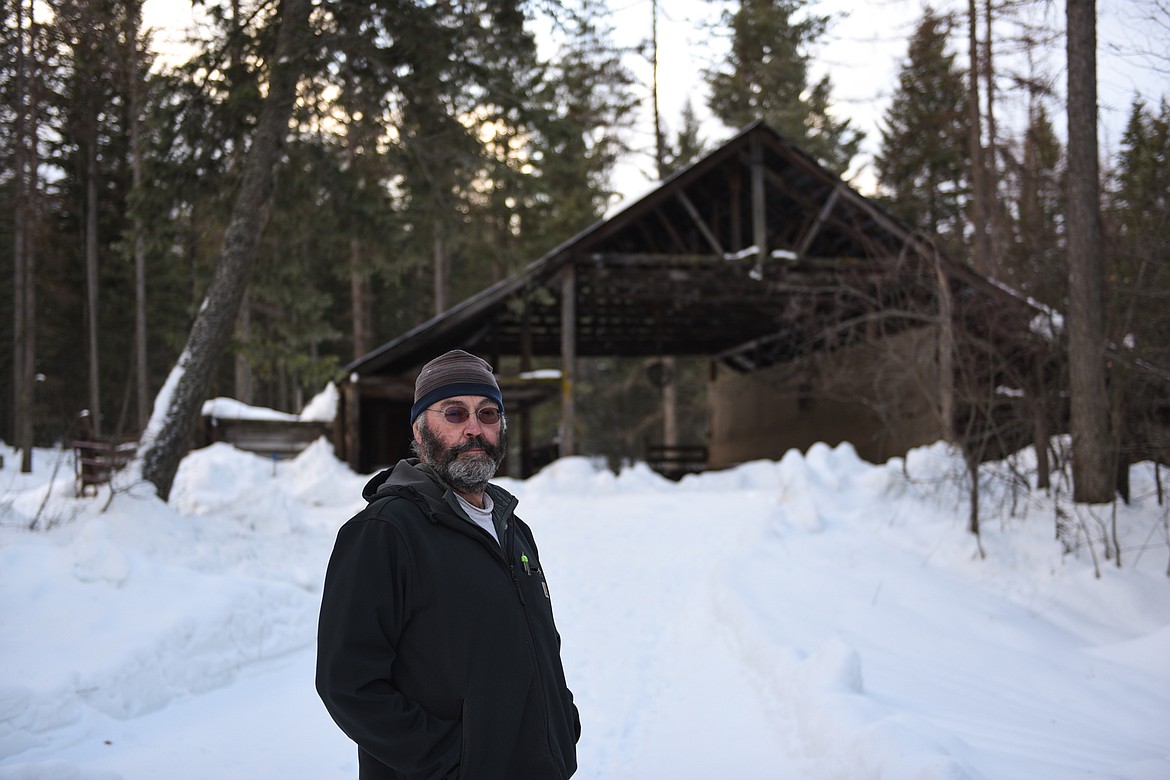 Doyle Foley stands in front of an old hay shed on the homestead that has been converted into use as a wedding venue. Foley manages Abbott Valley Homestead, which includes 270 acres owned by the Foley family.