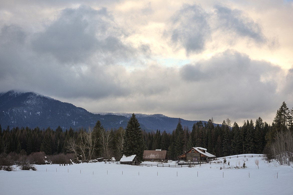 Mickey's cabin, right, and the Bunkhouse, center, at Abbott Valley Homestead in Martin City on Friday, Jan. 19. (Casey Kreider/Daily Inter Lake)