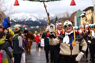 The Working Women of Whitefish make their way down Central Avenue during the Whitefish Winter Carnival Grand Parade on Saturday. The Carnival theme this year was Fly like and eagle. (Casey Kreider photos/Daily Inter Lake)