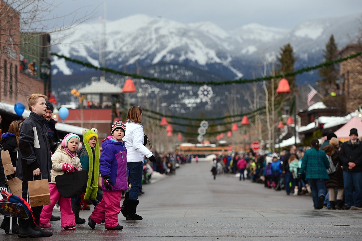 Spectators line Central Avenue in Whitefish before the start of the Whitefish Winter Carnival Grand Parade on Saturday. (Casey Kreider/Daily Inter Lake)