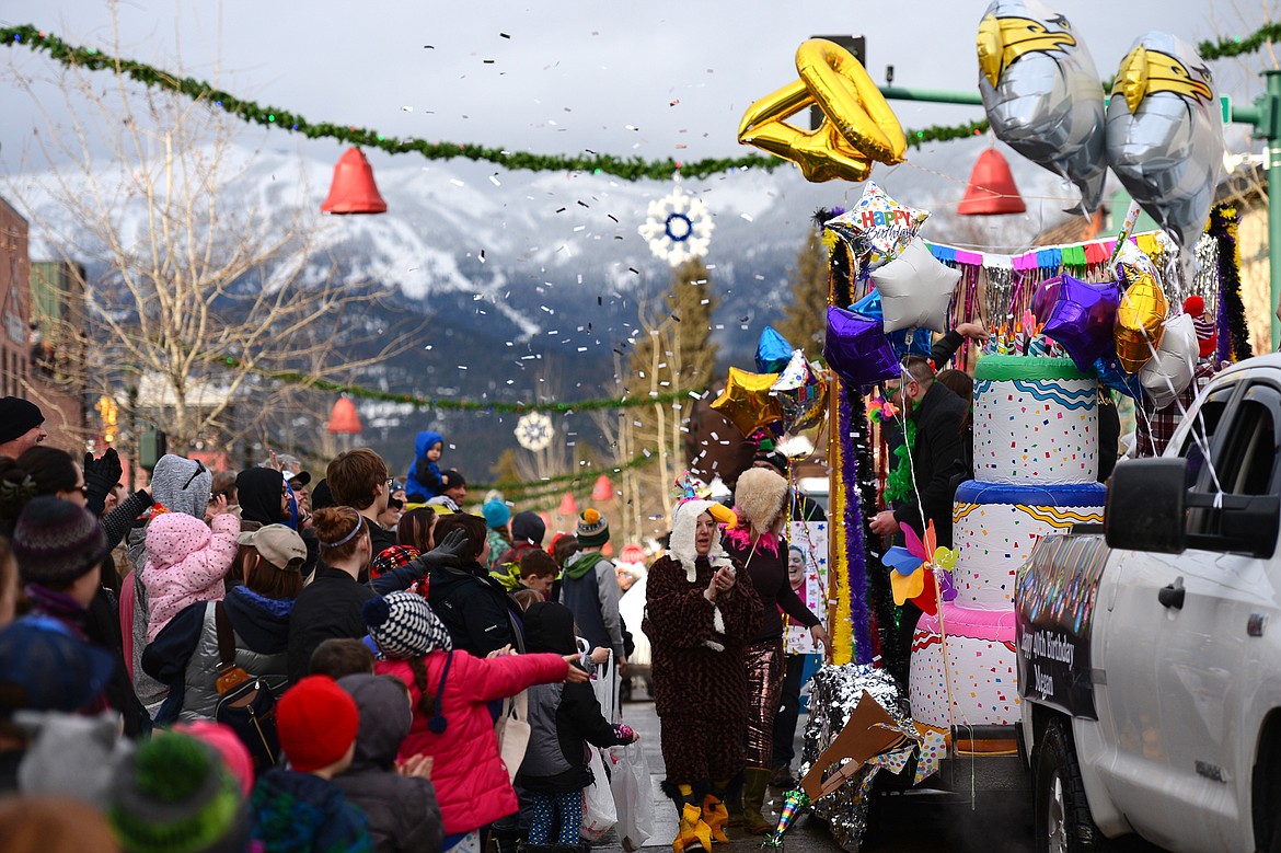 Floats make their way down Central Avenue during the Whitefish Winter Carnival Grand Parade on Saturday. (Casey Kreider/Daily Inter Lake)