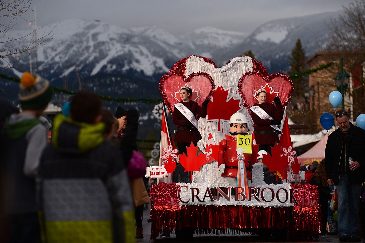 Floats make their way down Central Avenue during the Whitefish Winter Carnival Grand Parade on Saturday. (Casey Kreider/Daily Inter Lake)