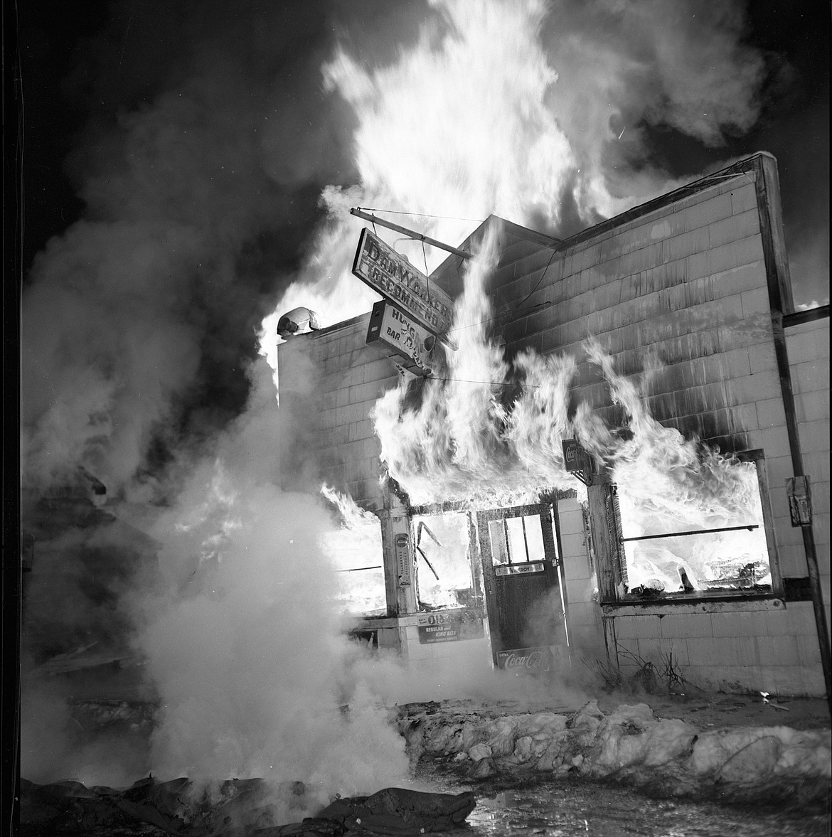 The Hungry Horse Bar in Martin City burns down in spectacular fashion, Feb. 8, 1960.