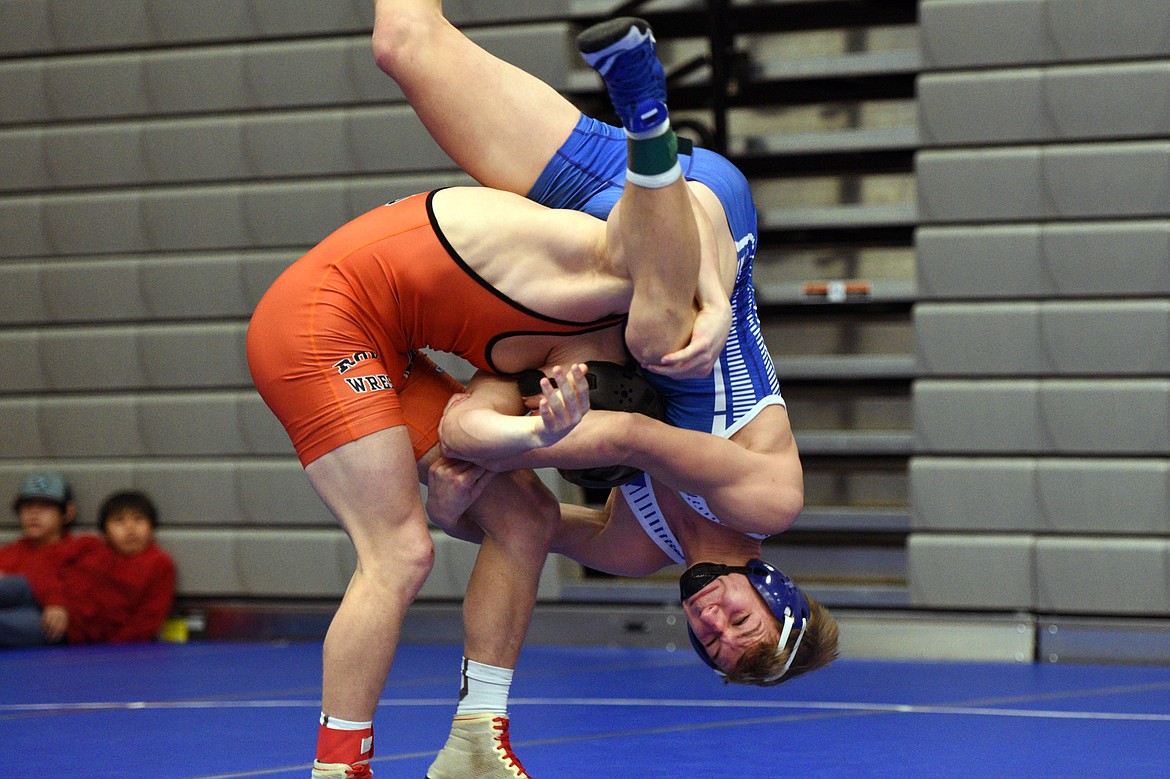 Columbia Falls&#146; Braydon Stone wrestles Ronan&#146;s Dan Cheff III at 160 pounds at the Western A Divisional seeding tournament at Columbia Falls High School on Friday. Cheff won by decision, 7-5. (Casey Kreider/Daily Inter Lake)