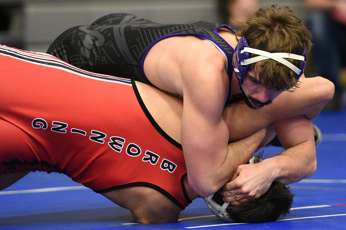 Polson&#146;s Noah Humphrey wrestles Browning&#146;s Ryan Longtimesleeping at 182 pounds at the Western A Divisional seeding tournament at Columbia Falls High School on Friday. Longtimesleeping won by pin. (Casey Kreider/Daily Inter Lake)