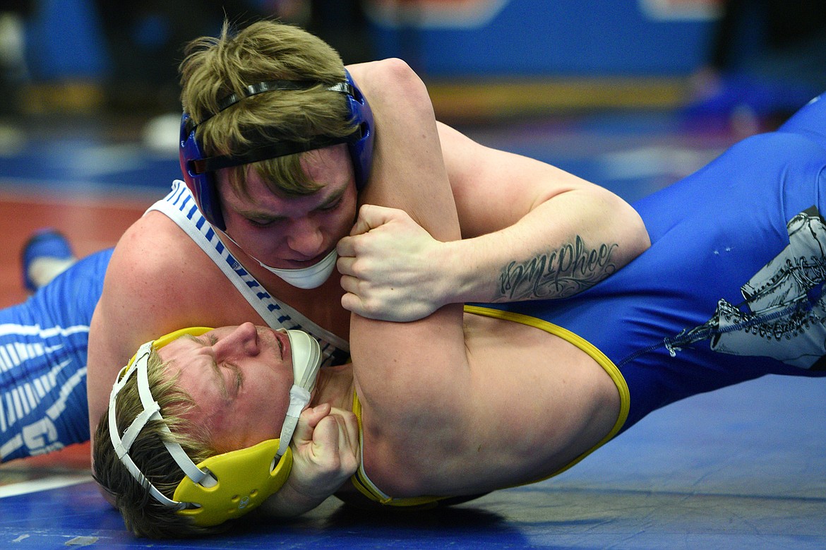 Columbia Falls&#146; Colten McPhee pins Libby/Troy&#146;s Ethan Borden at 182 pounds at the Western A Divisional seeding tournament at Columbia Falls High School on Friday. (Casey Kreider/Daily Inter Lake)