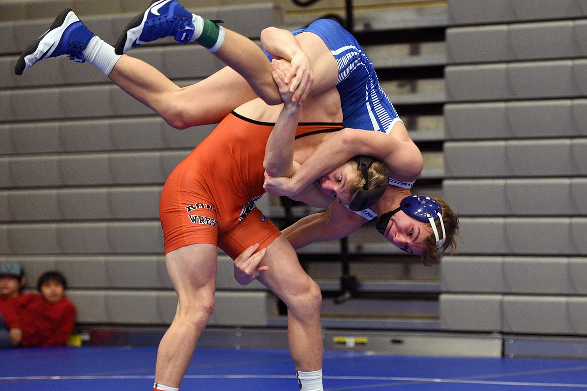 Columbia Falls&#146; Braydon Stone wrestles Ronan&#146;s Dan Cheff III at 160 pounds at the Western A Divisional seeding tournament at Columbia Falls High School on Friday. Cheff won by decision, 7-5. (Casey Kreider/Daily Inter Lake)