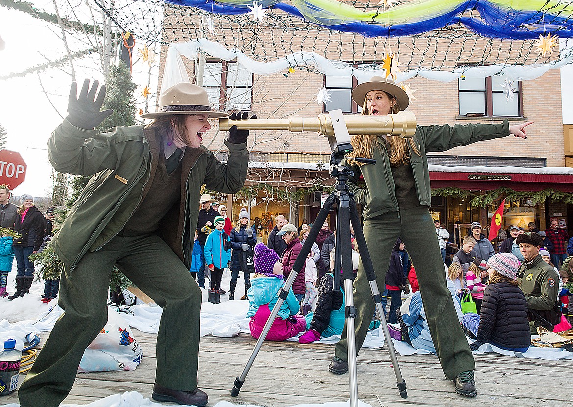 Glacier National Park was well respresented in the Winter Carnival. Here;s Tiegan Tomlin and Claudette Byrd-Rinck man Glacier&#146;s Dark Sky float.