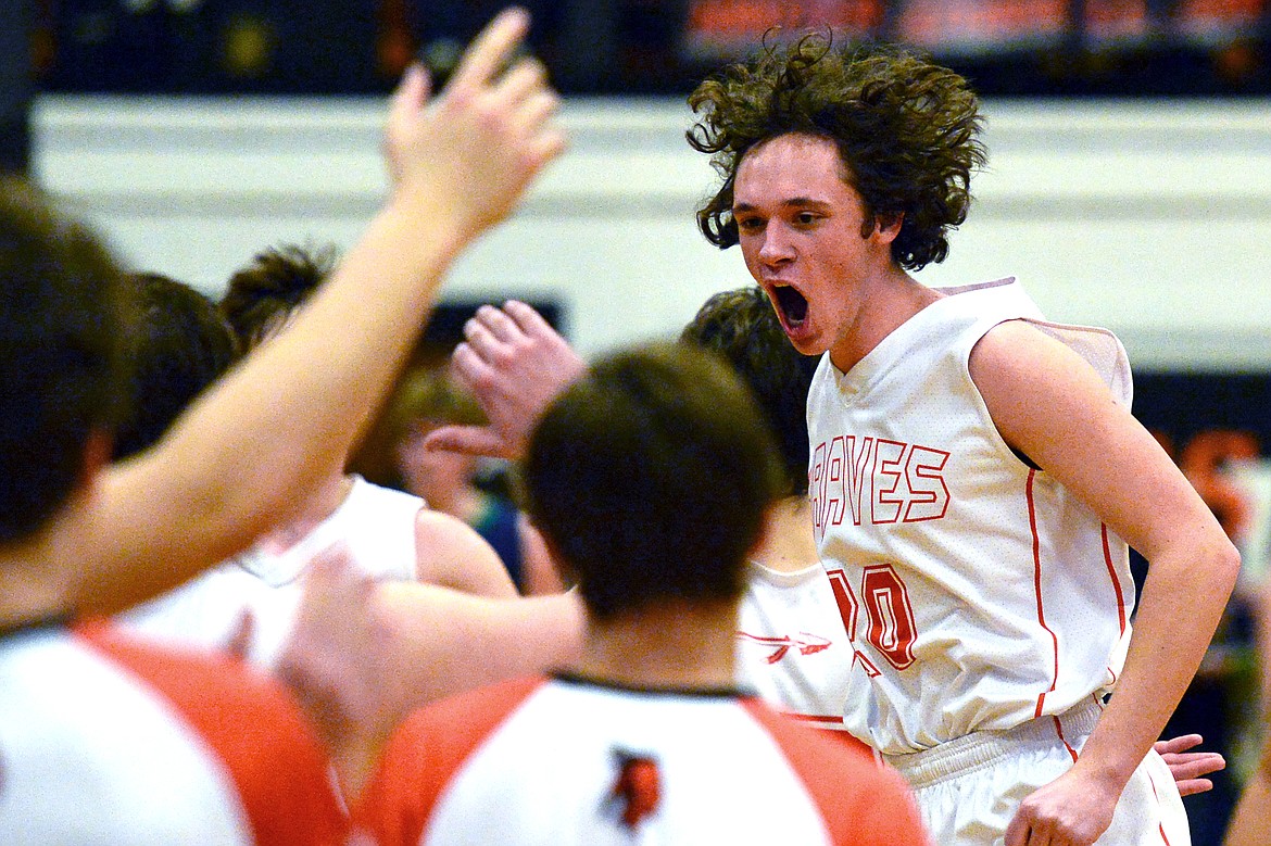 Flathead&#146;s Clayton Jacques celebrates after a 59-55 crosstown victory over Glacier at Flathead High School on Thursday. (Casey Kreider/Daily Inter Lake)