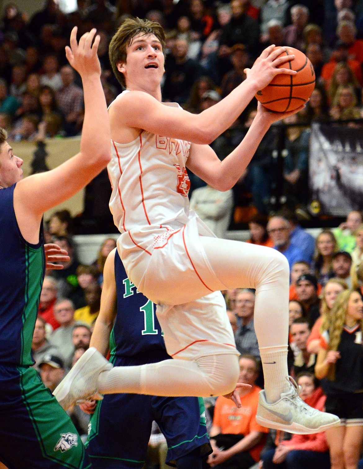 Flathead&#146;s Eric Seaman drives to the hoop during a 59-55 overtime crosstown victory over Glacier at Flathead High School on Thursday. (Casey Kreider/Daily Inter Lake)