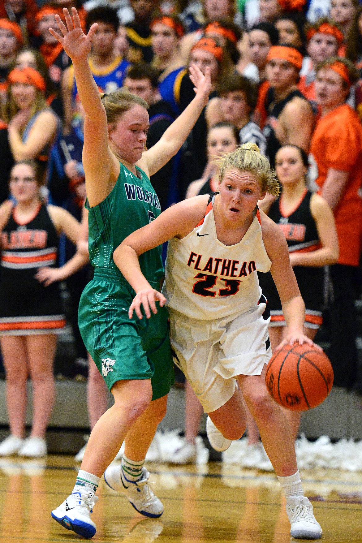 Flathead&#146;s Clara Vandenbosch dribbles around the defense of Glacier&#146;s Cadie Williams at Flathead High School on Thursday. (Casey Kreider/Daily Inter Lake)