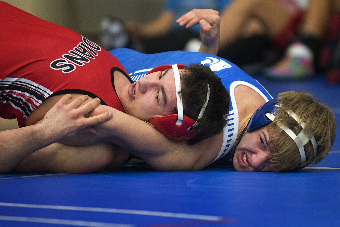 Columbia Falls wrestler Brayden Stone battles Browning's Ryan Kipp Friday. (Jeremy Weber photo)