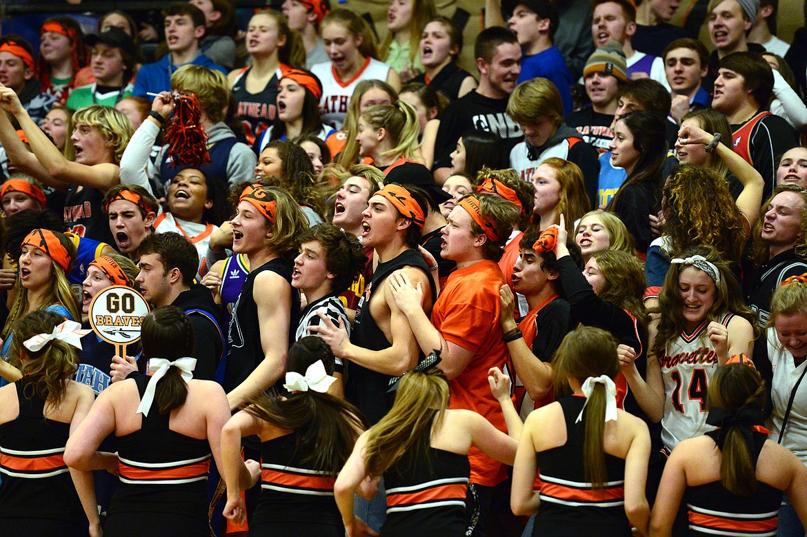 Flathead&#146;s student section cheers on the Bravettes during their 29-25 crosstown victory over Glacier at Flathead High School on Thursday. (Casey Kreider/Daily Inter Lake)