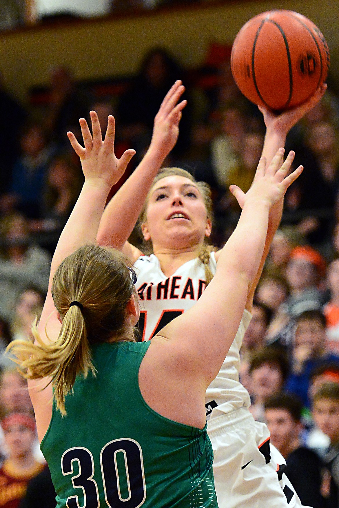 Flathead&#146;s Mary Heaton drives to the hoop with Glacier&#146;s Alivia Atlee defending. (Casey Kreider/Daily Inter Lake)