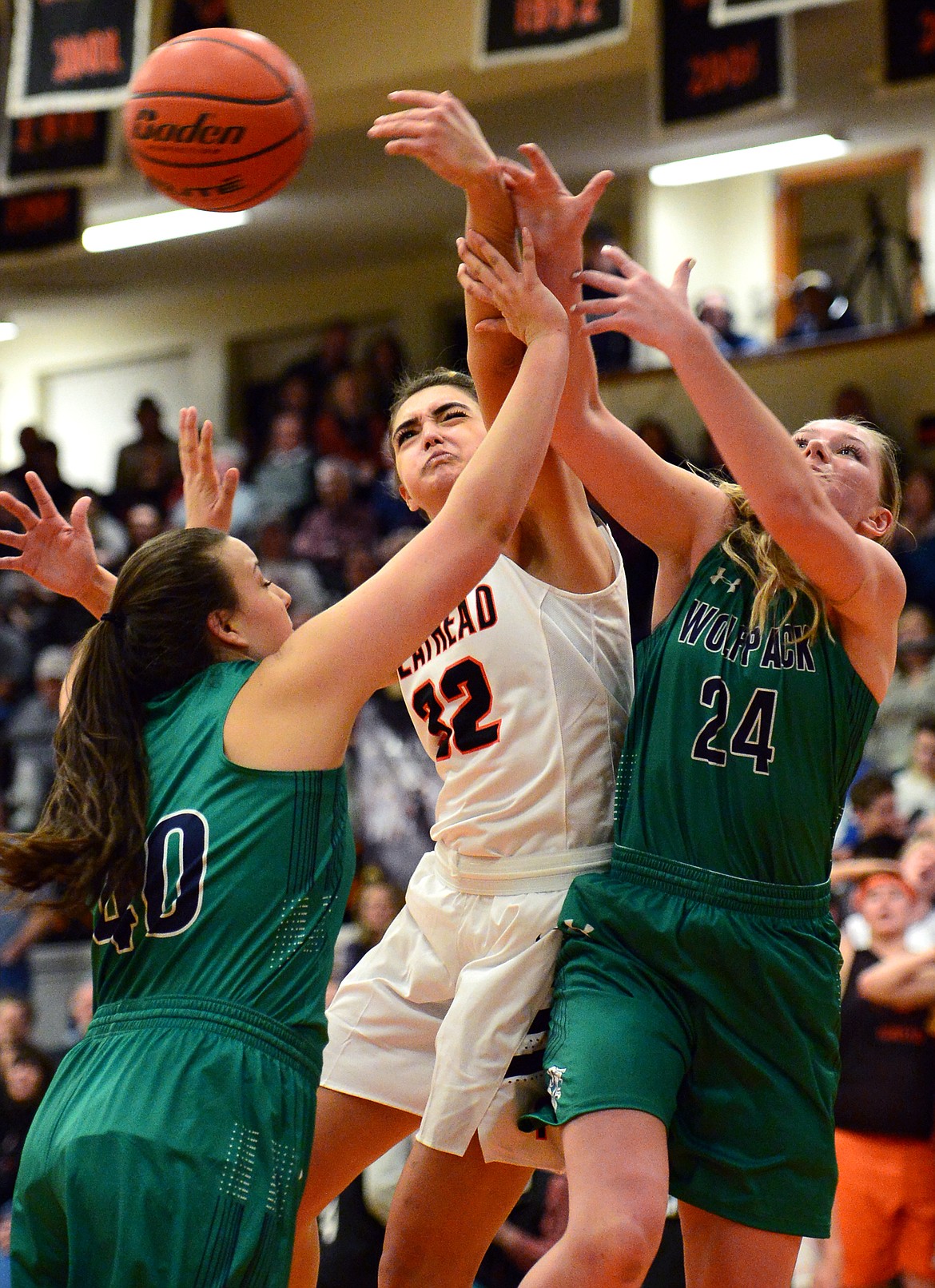 Flathead&#146;s Taylor Henley battles for a rebound against Glacier&#146;s Raley Shirey (40) and Kaileigh Crawford (24). (Casey Kreider/Daily Inter Lake)