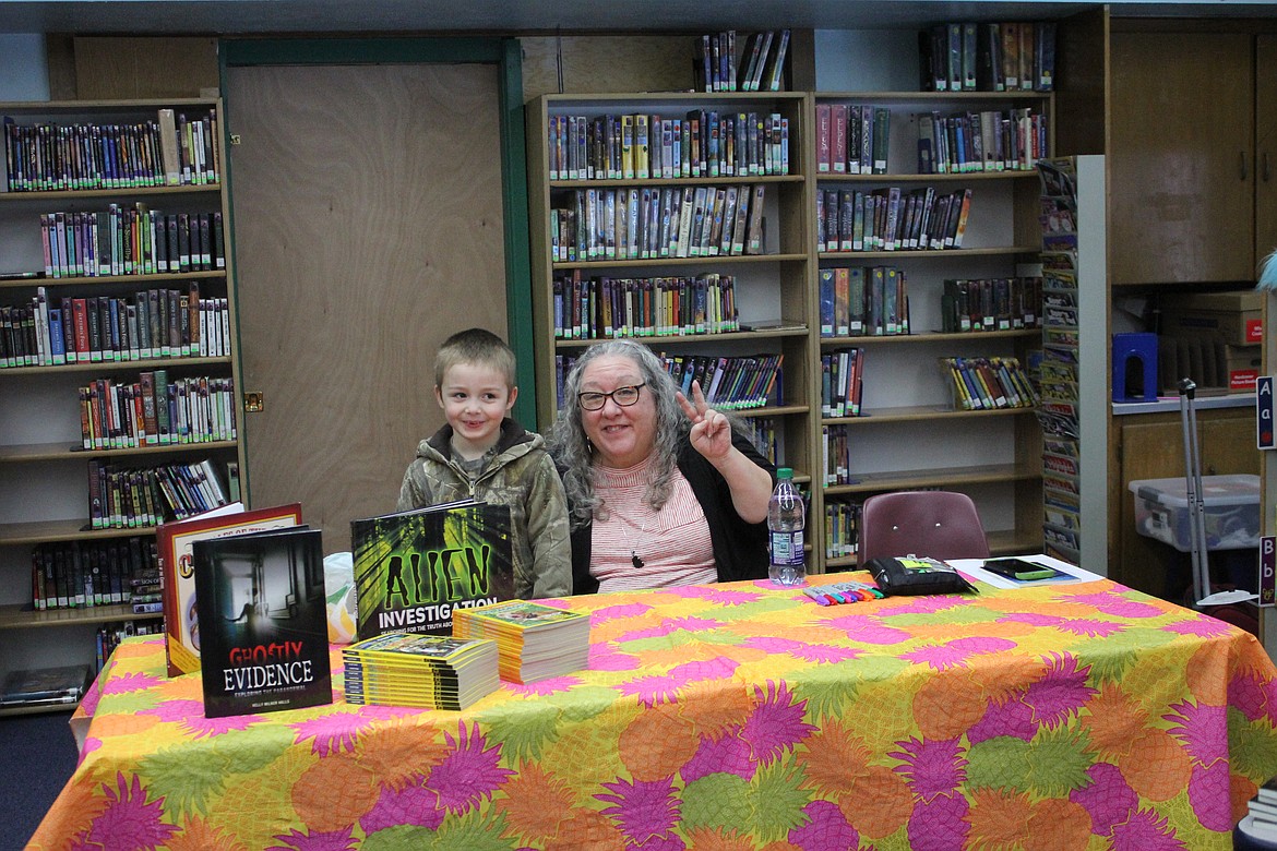 Photo by Tanna Yeoumans
First grader Ezekiel Cornett shows his excitement as he visits with author Kelly Milner Halls during the book signing period of her Jan. 25 visit to Valley View Elementary School.