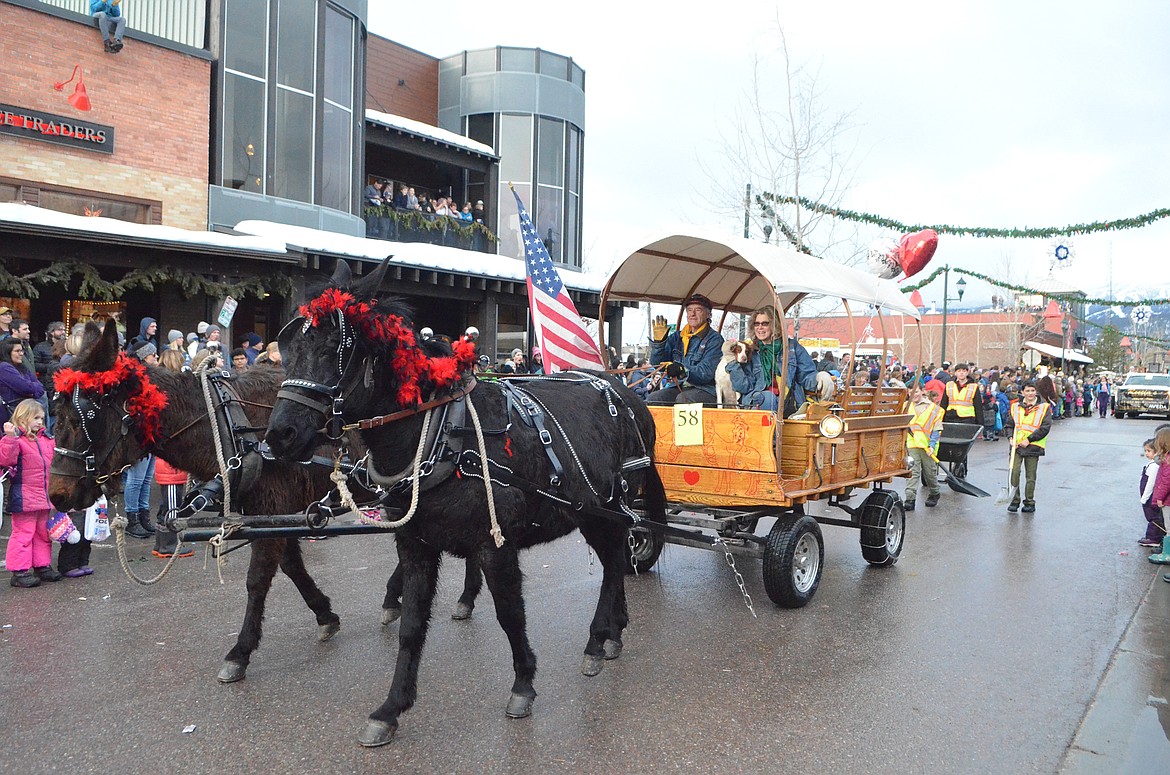 Floats make their way down Central Avenue Saturday during the Whitefish Winter Carnival Grand Parade. This year&#146;s theme for the 59th  annual Carnival was &#147;Fly Like an Eagle.&#148; (Heidi Desch/Whitefish Pilot)