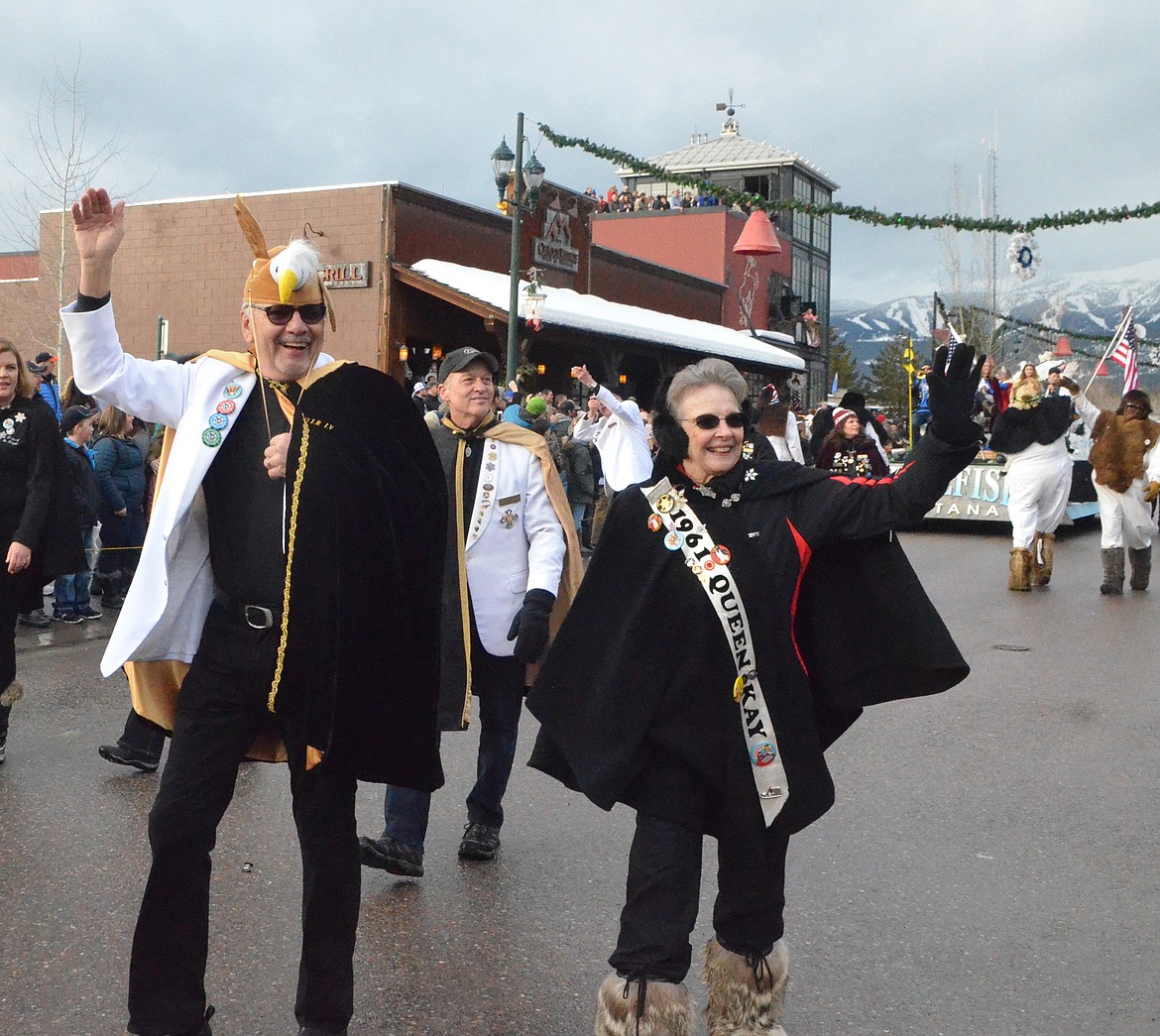 Former Winter Carnival Royalty leads the parade down Central Avenue. (Heidi Desch/Whitefish Pilot)