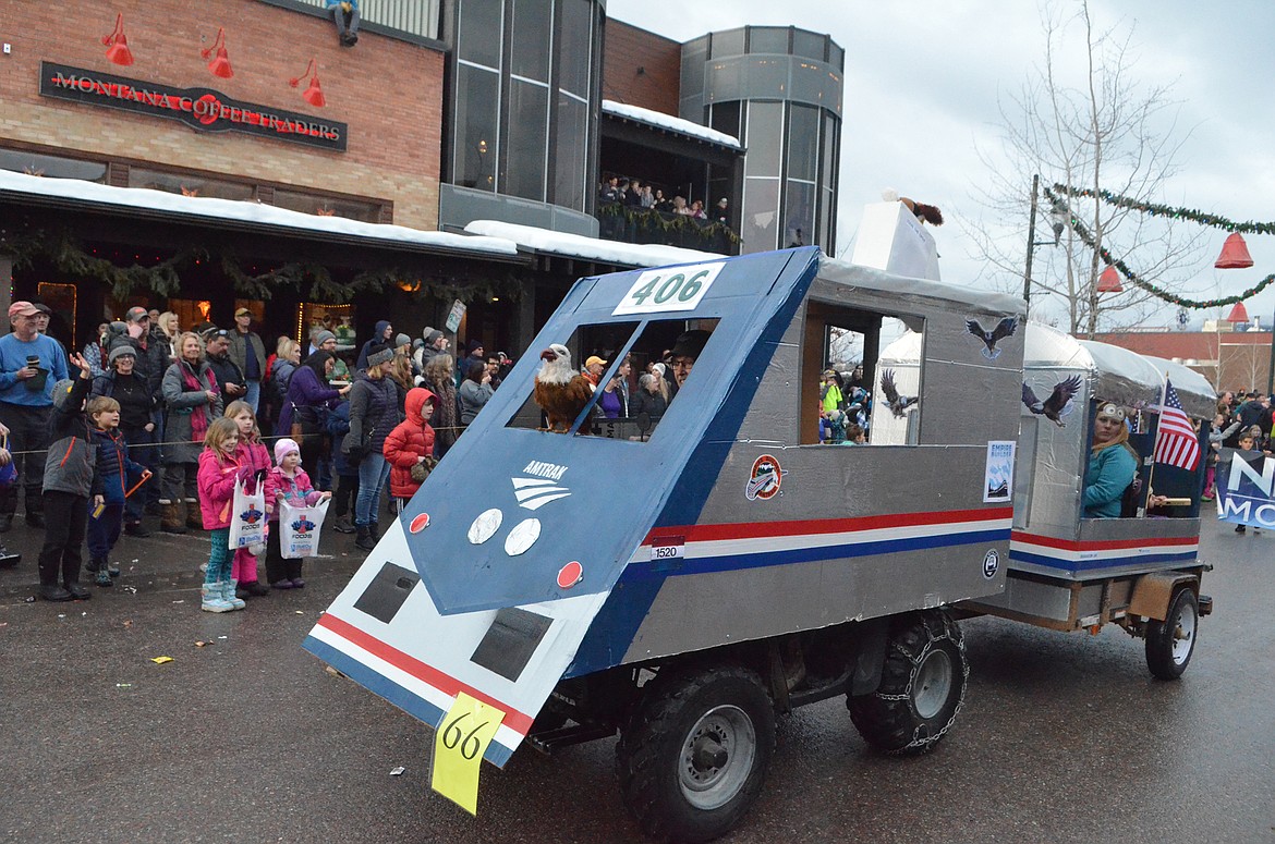 An Amtrak float makes its way down Central Avenue during the Winter Carnival Grand Parade. (Heidi Desch/Whitefish Pilot)