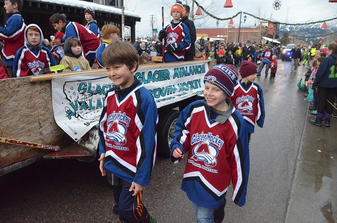 The Glacier Avalanche Youth Hockey team comes through downtown Saturday during the Whitefish Winter Carnival Grand Parade. This year&#146;s theme for the 59th  annual Carnival was &#147;Fly Like an Eagle.&#148; (Heidi Desch/Whitefish Pilot)