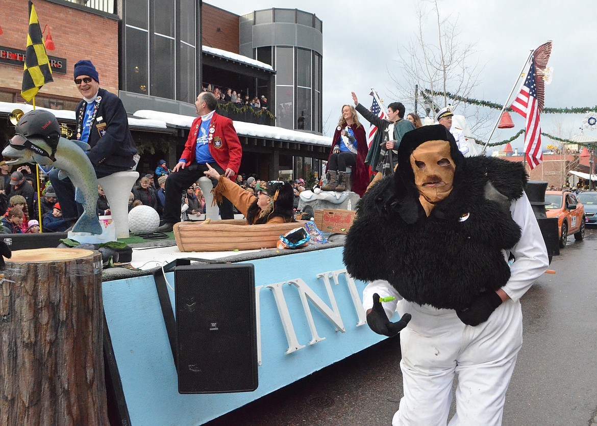 Floats make their way down Central Avenue Saturday during the Whitefish Winter Carnival Grand Parade. This year&#146;s theme for the 59th  annual Carnival was &#147;Fly Like an Eagle.&#148; (Heidi Desch/Whitefish Pilot)