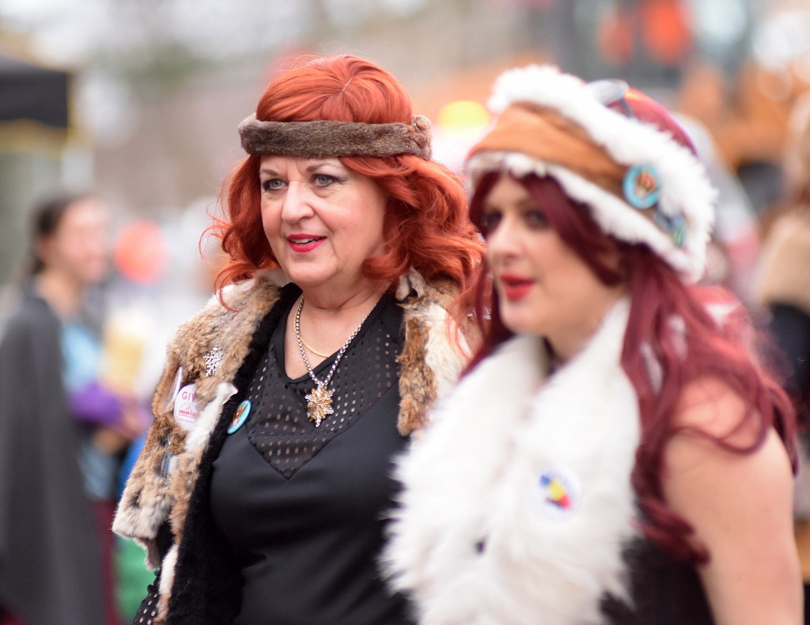 Viking Divas walk along Central Avenue. (Heidi Desch/Whitefish Pilot)