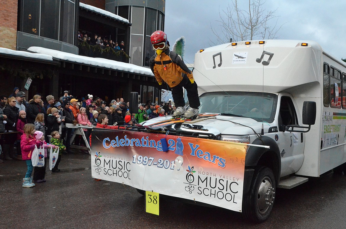 Floats make their way down Central Avenue Saturday during the Whitefish Winter Carnival Grand Parade. This year&#146;s theme for the 59th  annual Carnival was &#147;Fly Like an Eagle.&#148; (Heidi Desch/Whitefish Pilot)