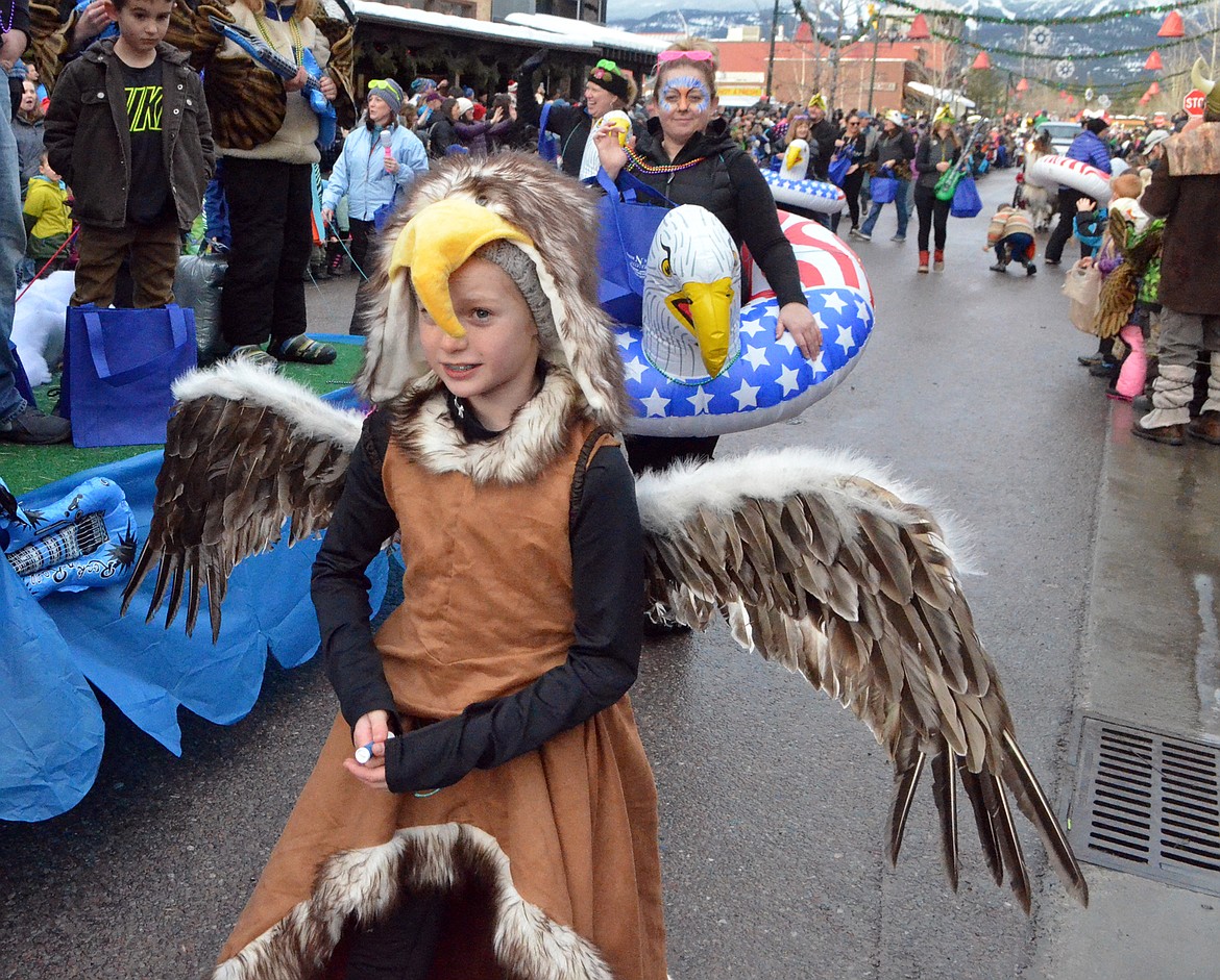 A youngster dressed as an eagle walks in the Grand Parade. This year&#146;s theme for the 59th  annual Carnival was &#147;Fly Like an Eagle.&#148; (Heidi Desch/Whitefish Pilot)